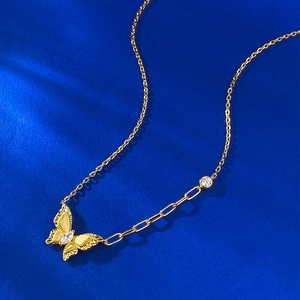 Elegant gold-plated S925 silver butterfly necklace with crystal inlay on blue background