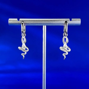 Macro detail of snake drop earrings in S925 silver with marquise-cut marquise stones