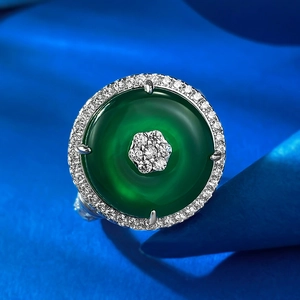 Macro shot of S925 silver ring featuring green chalcedony and micro-pave diamonds