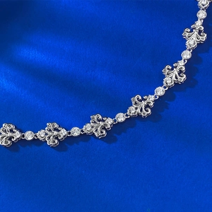 Adjustable S925 sterling silver bracelet featuring brushed fleur-de-lis and zircon stones