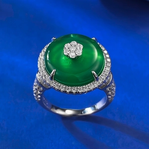 Detailed macro view of S925 silver ring featuring a green chalcedony stone and pavé zircons