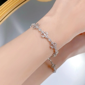 Close-up of S925 sterling silver iris flower bracelet with vintage brushed finish and zircon