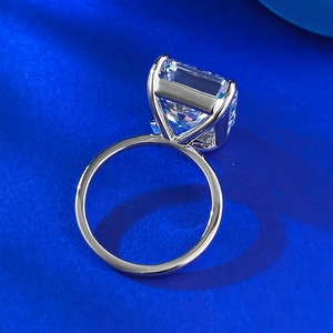 Macro view of 12*14mm ice flower cut radiant sparkling gemstone in 925 silver four-prong setting