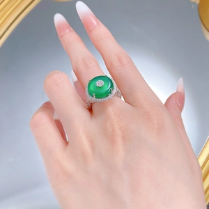 Detailed macro view of S925 silver ring featuring green chalcedony and diamond accents