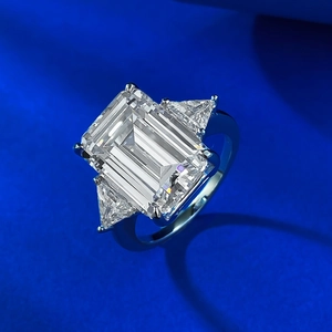 S925 silver ring featuring a large 10x14mm emerald cut center stone and side trillion diamonds