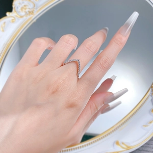 Elegant S925 sterling silver V-shaped ring with pavé cubic zirconia on finger