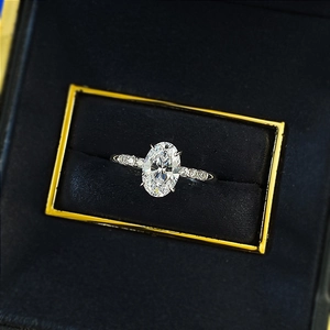 Minimalist S925 silver ring featuring a 6x9mm oval cut white stone in a luxury blue box
