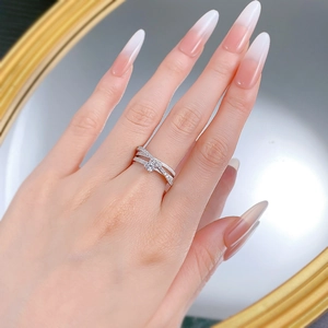 Close-up of S925 silver triple layer ring with micro-pave cubic zirconia on hand