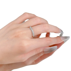 Elegant S925 sterling silver wave ring with pavé diamonds worn on a finger
