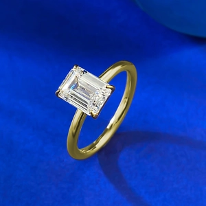 S925 silver gold plated ring featuring a large emerald cut cubic zirconia in a four-claw setting