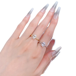 Minimalist S925 silver oval-cut gemstone rings in gold and silver finishes on hand