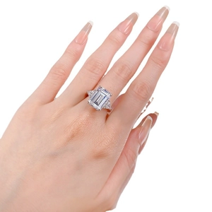 S925 silver ring with 10x14mm emerald-cut center stone and triangular side diamonds