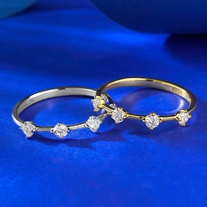 Macro detail of S925 sterling silver rings with four brilliant-cut round zircons