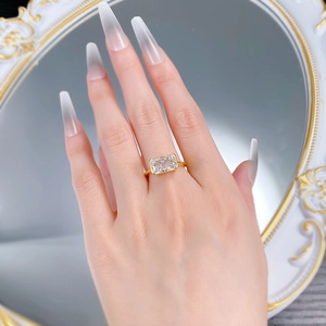 Close-up of gold-plated S925 silver ring with rectangular ice-flower cut gemstone
