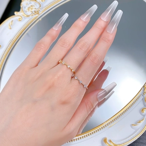 Minimalist S925 sterling silver rings with five cubic zirconia stones in gold and silver