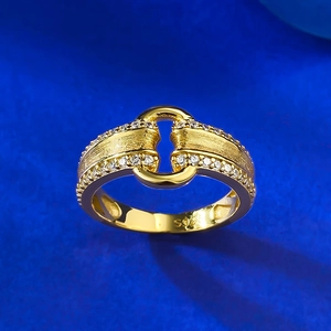 Macro shot of S925 sterling silver ring with brushed texture and micro-set zircons