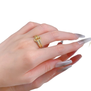 Brushed gold buckle ring with sparkling pavé cubic zirconia accents for a luxury look