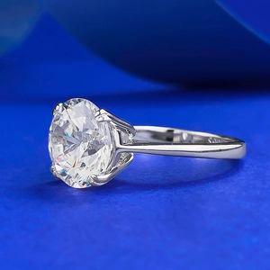 Macro shot of 10mm round cut sparkling diamond ring with S925 sterling silver stamp