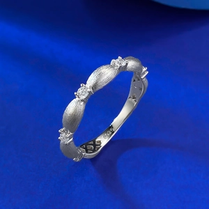 Brushed S925 sterling silver ring featuring three white cubic zirconia stones in a row