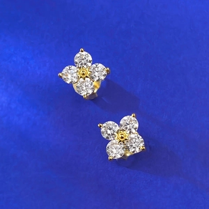 Elegant S925 silver four-leaf clover stud earrings with 18K gold finish and clear gems