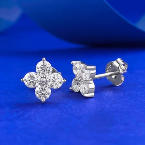 Elegant S925 sterling silver four-leaf clover stud earrings with sparkling white zircons