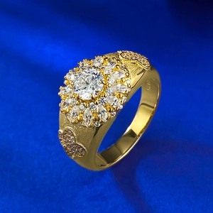 Bague fleur en argent S925 plaqué or avec pierre de zircon et détail papillon sur soie