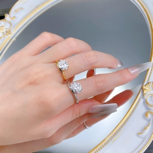 Close-up of S925 silver rings with large round-cut stones and twisted arm design