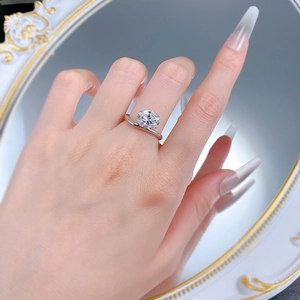 Detailed view of S925 silver ring with large round crystal and twisted band on a hand