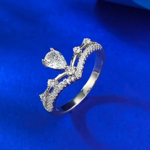 Close-up of S925 silver crown ring featuring a pear-cut zircon and V-shaped diamond band