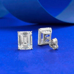 S925 Sterling Silver emerald cut 7x9mm lab diamond stud earrings on a dark blue background