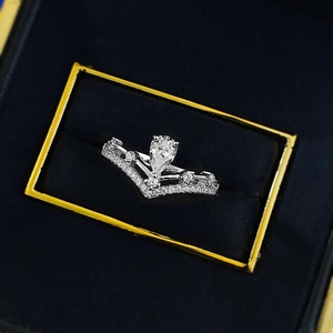 Elegant S925 sterling silver crown ring with pear-shaped zircon in a luxury jewelry box