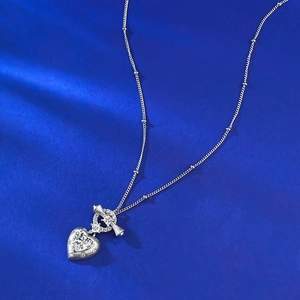 Elegant S925 sterling silver heart pendant necklace with shimmering zircon and OT clasp
