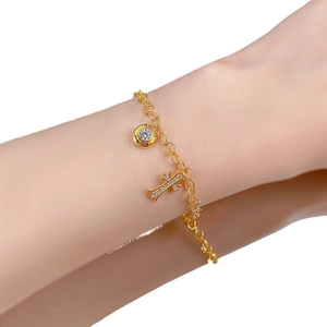 Bracciale in argento S925 placcato oro con ciondolo a croce e un grande cristallo