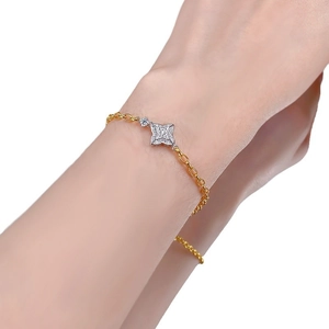 Elegant S925 silver four-pointed star bracelet with pavé stones and gold chain detail