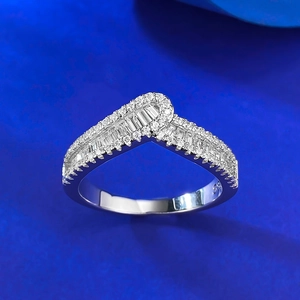 Macro shot of V-shaped S925 sterling silver ring with princess cut cubic zirconia