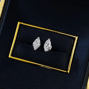 S925 silver marquise-cut stud earrings in a premium blue velvet jewelry display box