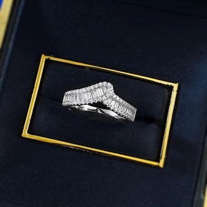 Elegant S925 sterling silver V-shaped ring with baguette diamonds in a navy velvet box