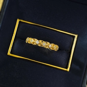 Vintage gold S925 silver lace ring with sparkling diamonds in a black velvet box