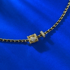 S925 Silber Armband mit geflochtener Kordel und goldenem Kleeblatt-Anhänger mit Diamanten