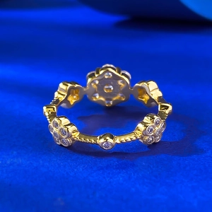 Luxurious S925 silver flower ring with gold finish and sparkling white zircon stones