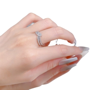 Sparkling S925 sterling silver wavy baguette cut ring worn on a woman's finger