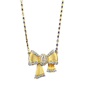 S925 silver gilded bow necklace with marquise stone and blue enamel accents