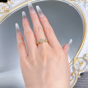 Macro detail of luxury flower ring with gold finish and sparkling crystal petals