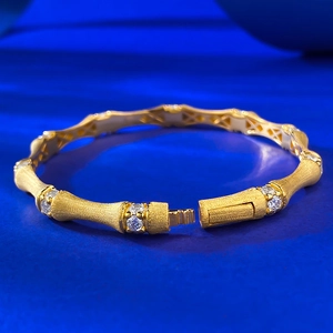 Italian vintage style brushed gold bamboo joint bangle with sparkling zircon accents