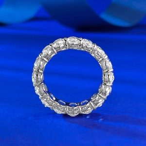 S925 sterling silver eternity ring featuring brilliant oval-cut stones in a prong setting