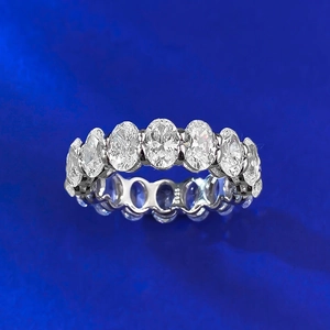 Detailed macro view of S925 sterling silver stamp on oval-cut eternity ring band