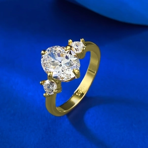 Elegant S925 silver gold plated three-stone ring with oval cubic zirconia main stone