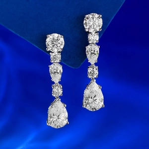 Elegant S925 silver long drop earrings featuring round and 8x12mm pear-shaped crystals