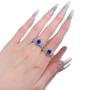 S925 silver oval blue sapphire halo ring set in gold and silver finish with pavé band