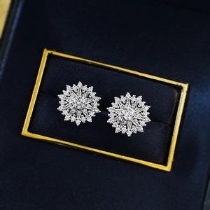 Sparkling S925 sterling silver snowflake stud earrings set in premium blue velvet gift box